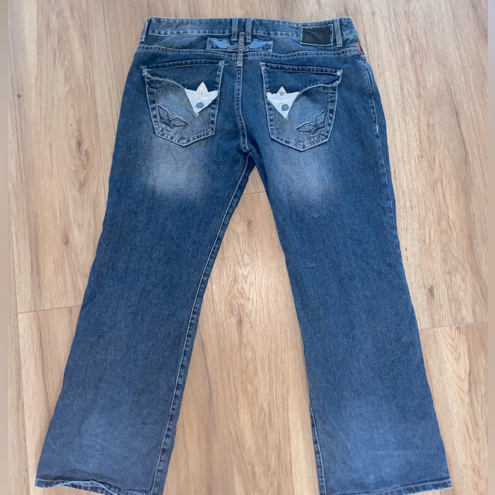 bedazzled rare baggy robin jeans with button pockets